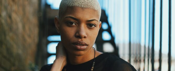photo of a shy person looking at the camera