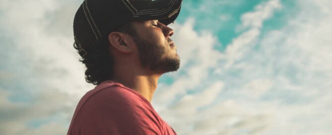 A man is connecting with nature to relieve stress